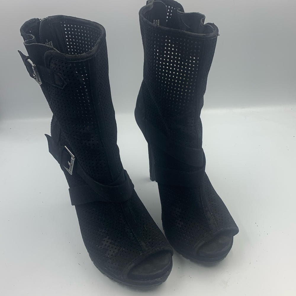 Black high heel booties.